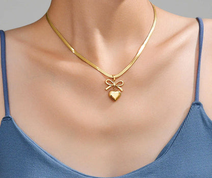 BOW HEART PENDENT NECKLACE (Gold Platted)